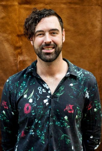 portrait-of-a-cheerful-man-2022-09-16-08-24-49-utc-e1668569344841.jpg